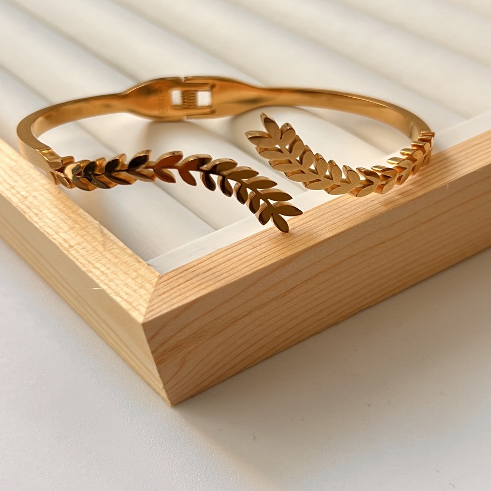 Βραχιόλι χειροπέδα χρυσά φτερά