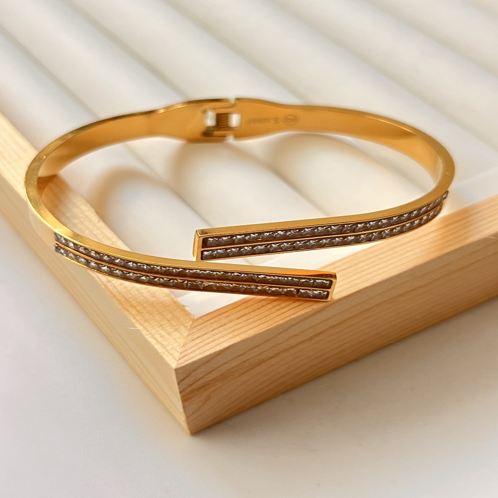 Βραχιόλι χειροπέδα χρυσή με στρας