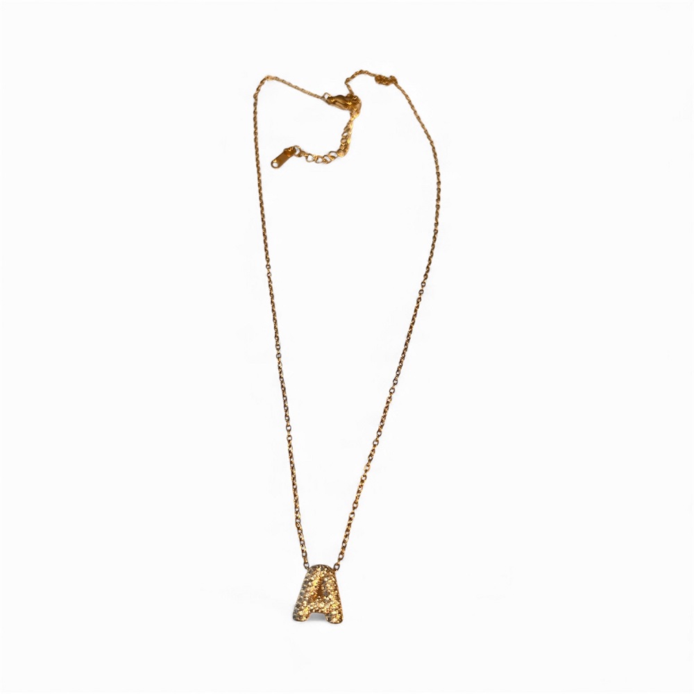 Χρυσό  κολιέ μονόγραμμα με λαμπερές ζιργκόν πέτρες.