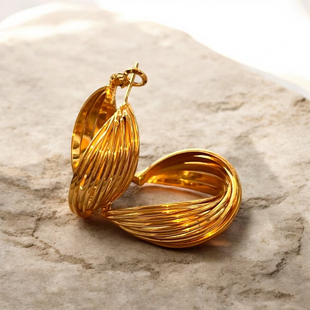 Σκουλαρίκια χρυσά με κυματιστή υφή